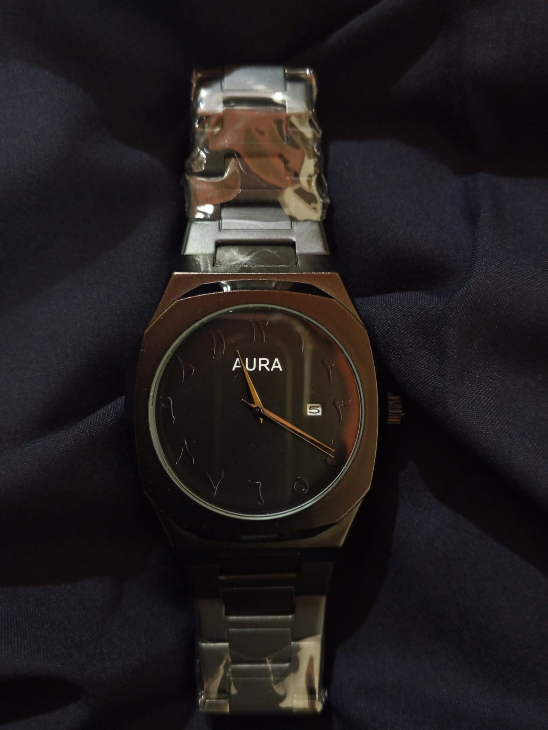 Original black Aura watch with metallic chain